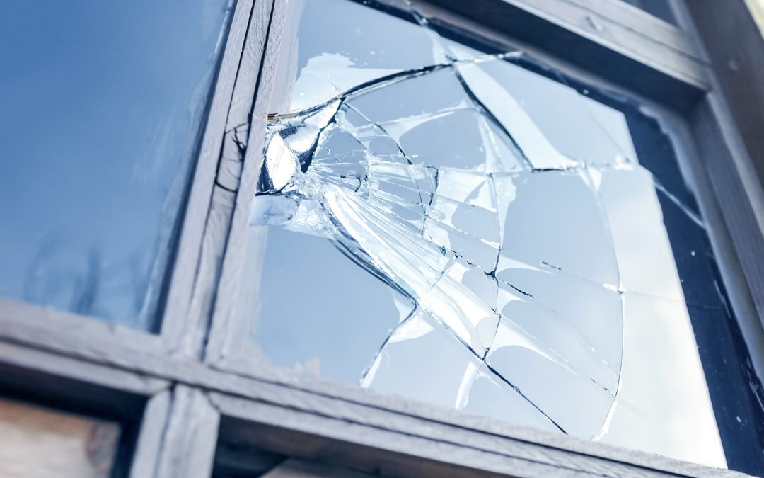 broken pane of glass in window