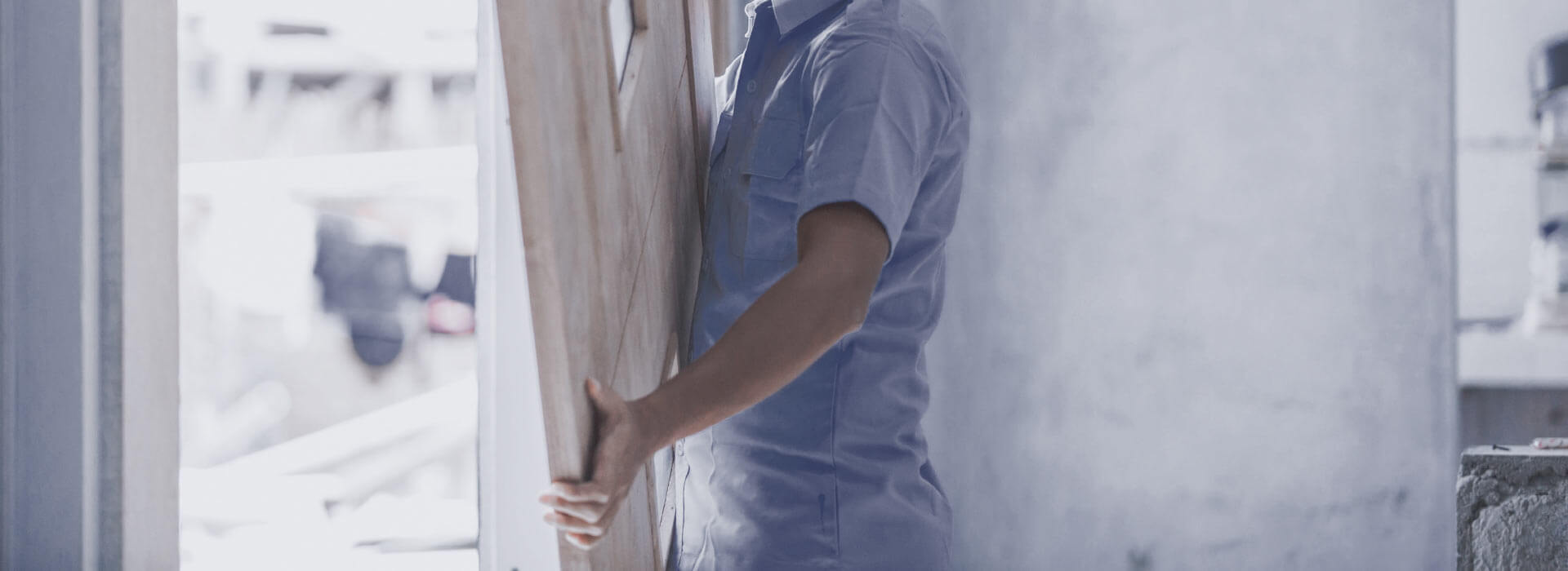 What do you call someone who fixes doors? Who to call for that repair